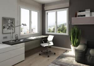 Fenetre PVC présentant une fenêtre qui protège des intempéries